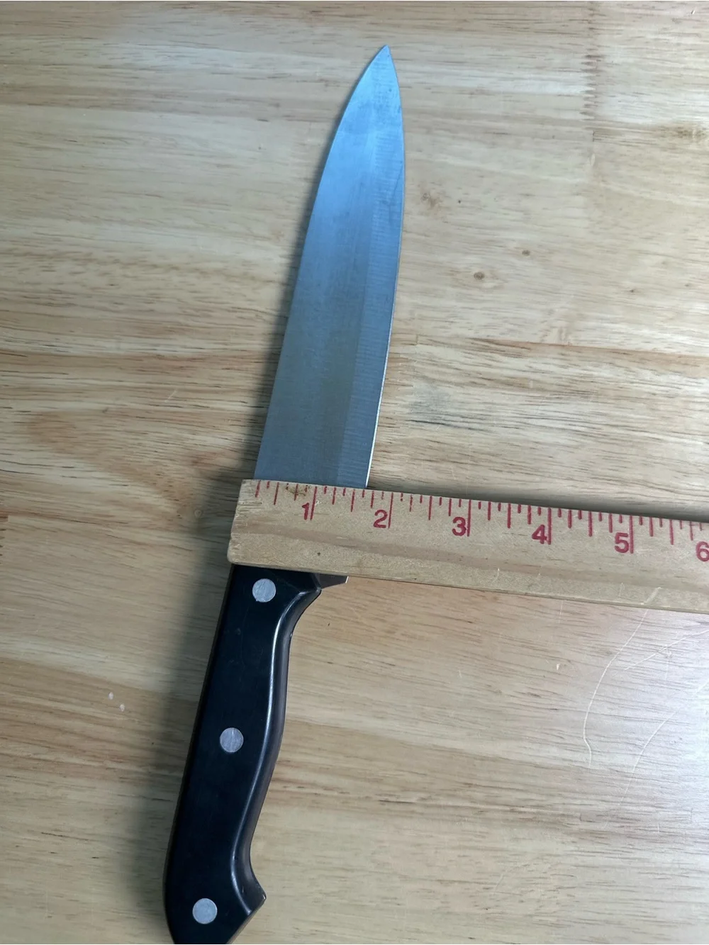 12.5” Stainless Chef Knife with Black Triple-Rivet Handle blade all thru wood